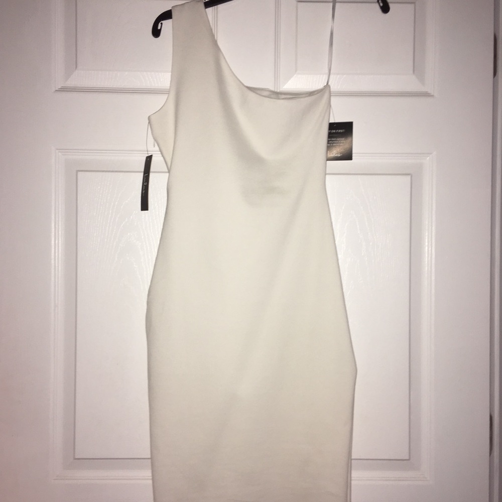 Lulu’s white, one shoulder body con dress.